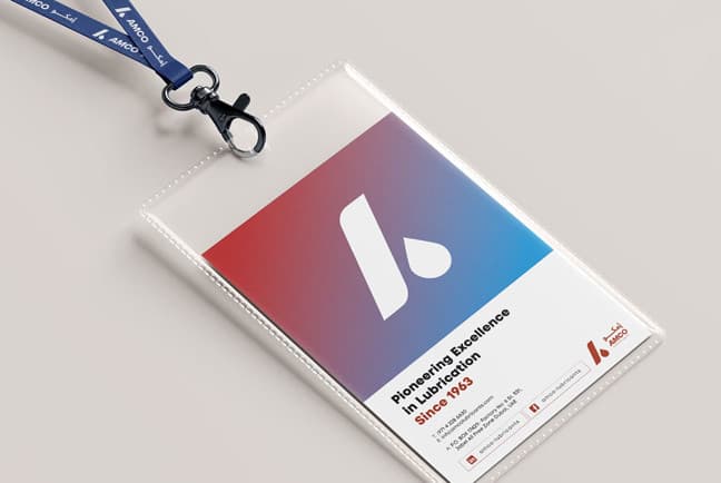 AMCO identity on a lanyard name badge